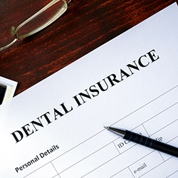 Dental insurance paperwork for the cost of dentures in Lady Lake