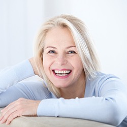 A middle-aged woman feeling happy about her new dental implants in Lady Lake