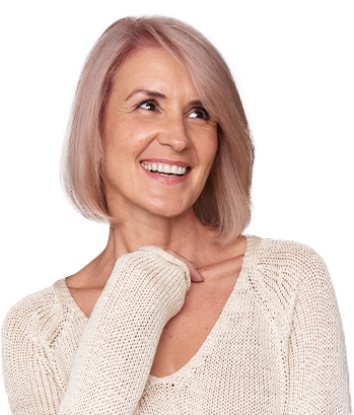 Older woman in white sweater smiling