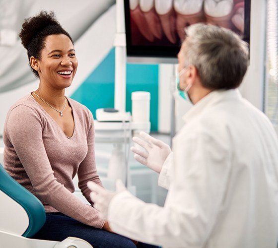patient and dentist discussing the cost of veneers in Lady Lake