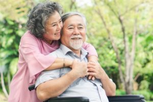 smiling couple who are not too old for dental implants